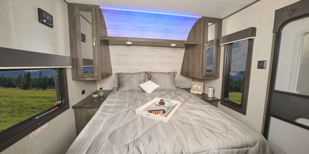 Bedroom interior of travel trailer.