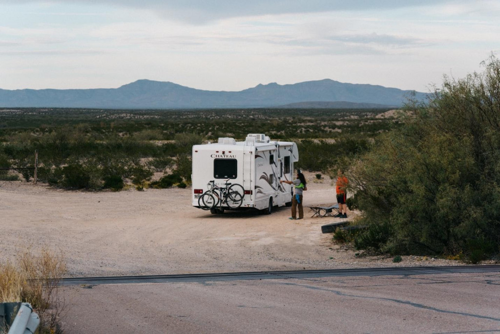 First time RV campers on a dirt road.
